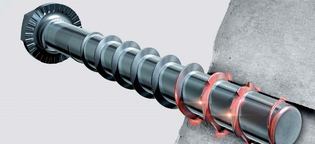 close up shot of screw in anchor or screw bolt cutting thread in concrete