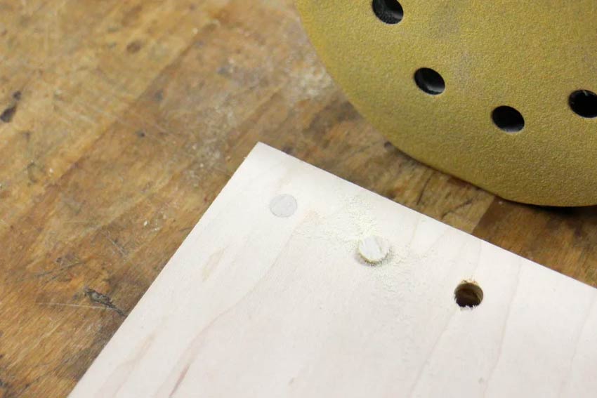 How To Hide Screws In Wood - sanding the wood plug flush