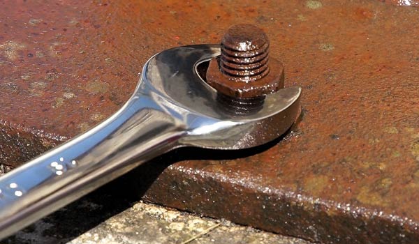 How To Remove Rusted Bolts - use some force to try to remove a rusted bolt