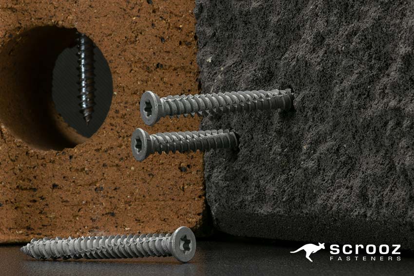  Raptr Self Tapping Concrete Screws drilled into blocks of concrete