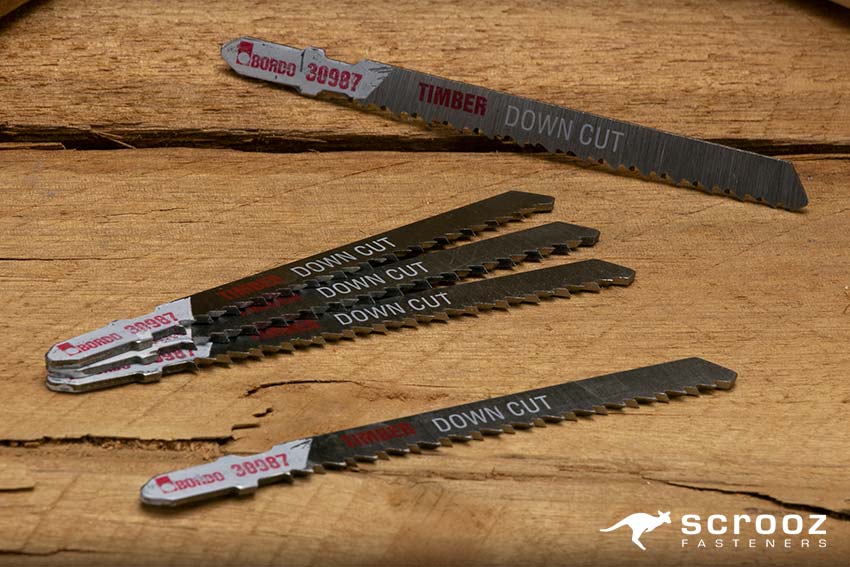 Saw Blades for Wood and Metal on wooden background.