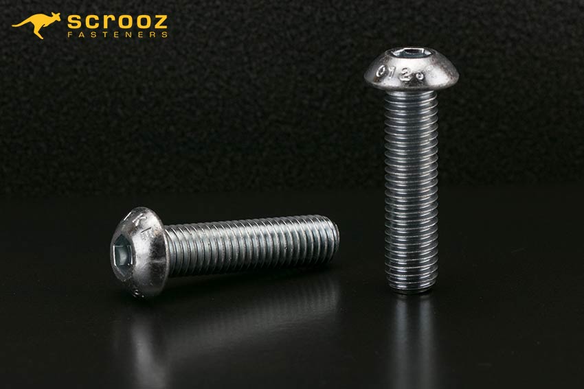 Button Head Cap Screws Zinc made from 10.9 High Tensile Alloy Steel. Close up shot of two Cap Screws