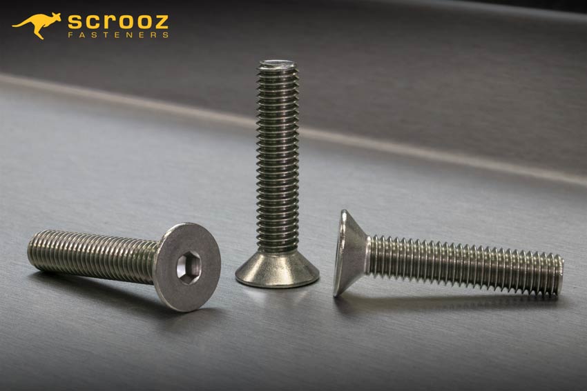Countersunk head cap screws 304Gr main image. Two stainless screws on black background