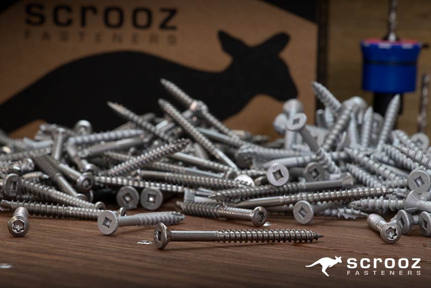 What size decking screws to use - a pile of different style decking screws